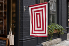 Custom-sized flag with your own design on a building façade — premium full-colour print